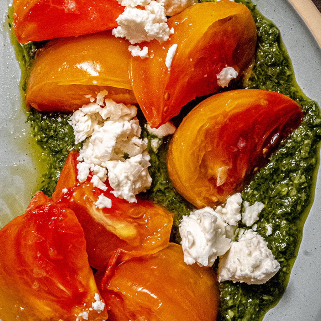 Marinated Heirloom Tomatoes with Pesto & Feta