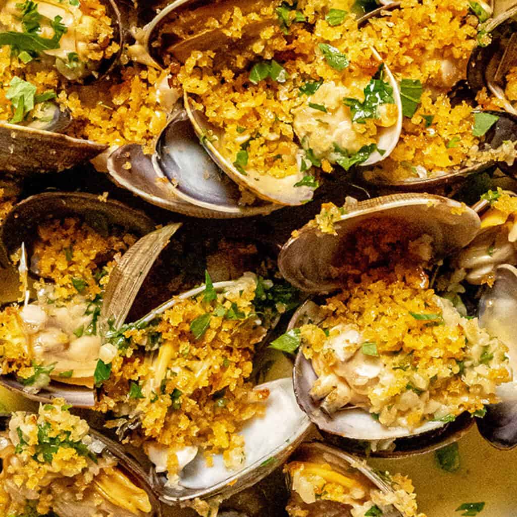 Clams with White Wine Sauce & Calabrian Chili Breadcrumbs