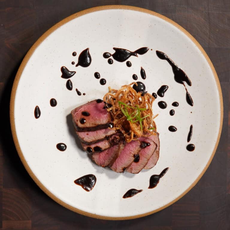 Maui Nui Venison with Black Garlic–Soy Glaze & Fried Shallot