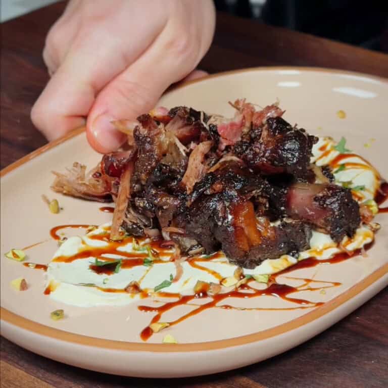 Smoked Harissa-Rubbed Lamb Shoulder with Smoked Paprika Labneh