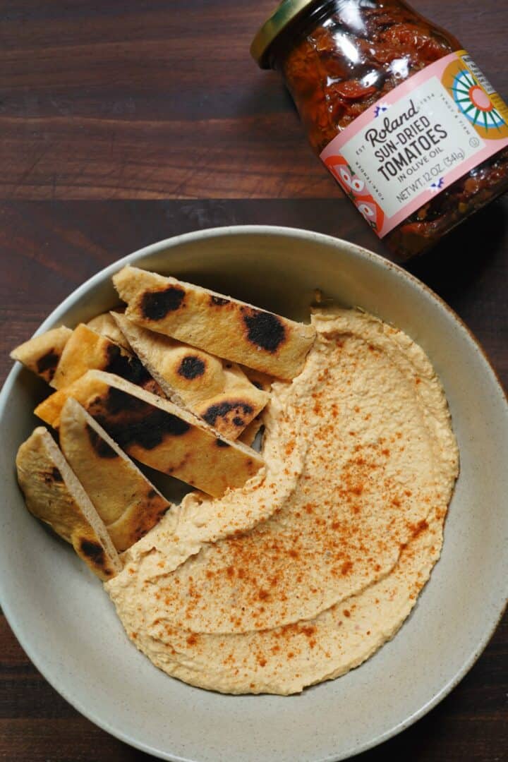 Sun-dried tomato hummus with handmade pita